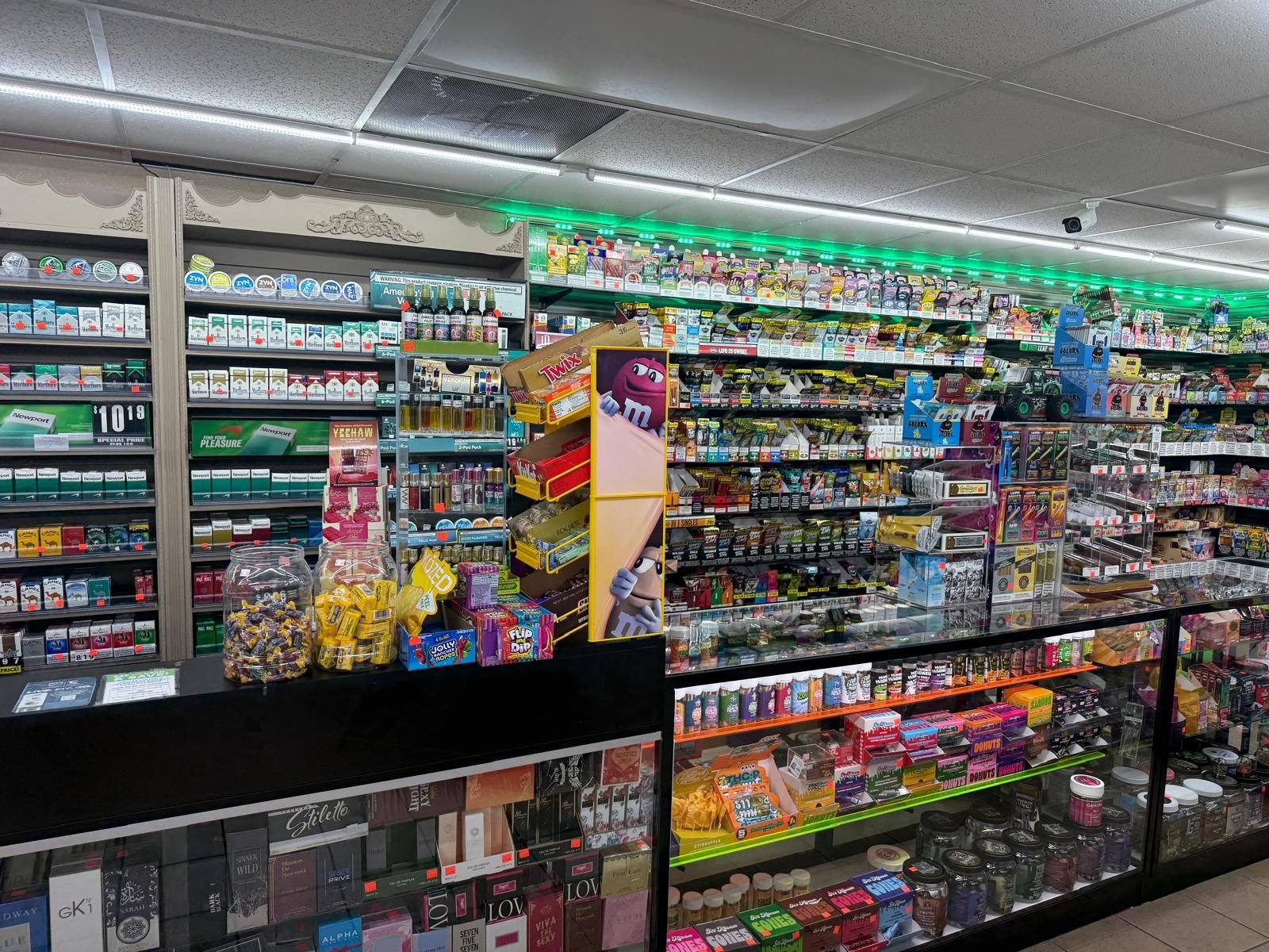 Cigarette and vape wall behind the counter